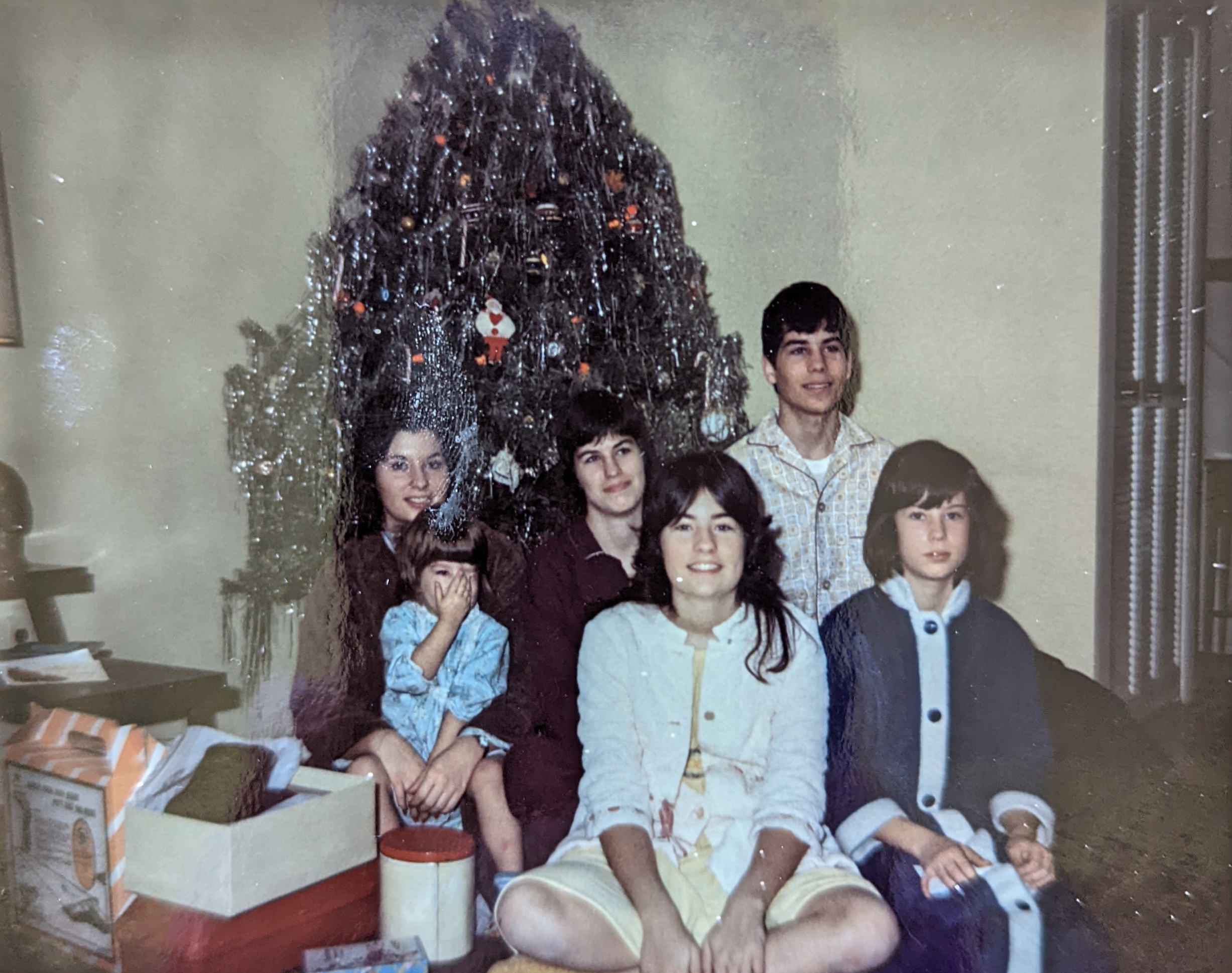 James Bartlett with sibs by xmas tree